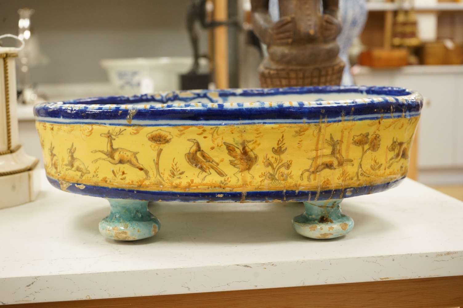 An early 20th century French faience oval footed dish, 44cm